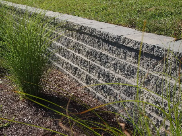 Stone masonry and hardscape project completed in July 2016.
