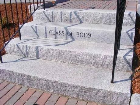 Granite entry steps and landing at a home.