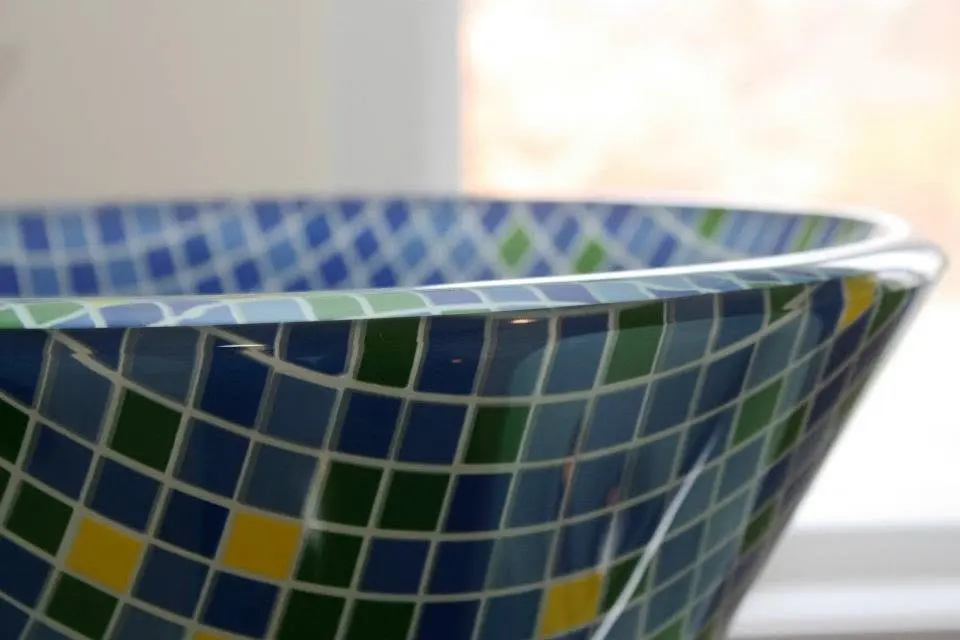 Stone and glass tile backsplash detail.
